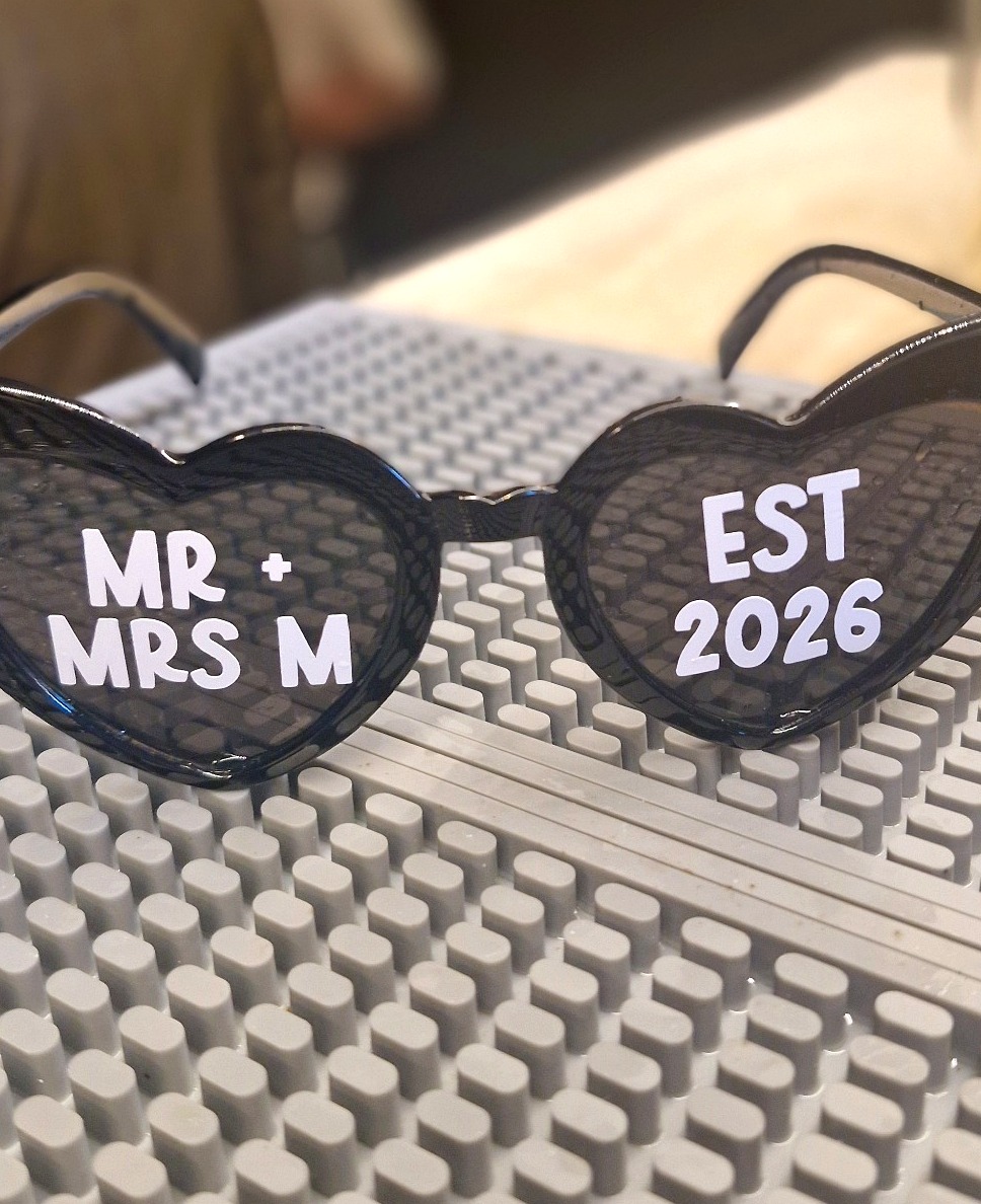 Wedding sunglasses detail at the bar