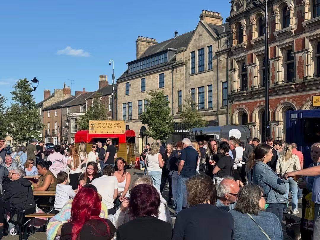 Crowds enjoying a busy town-centre event